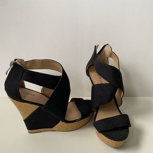 Black wedge sandals.